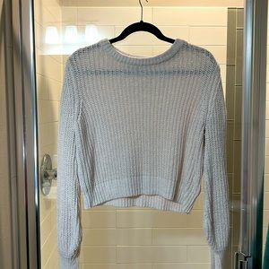 Express X Olivia Culpo off-white cropped sweater.